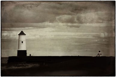Lighthouse on pier. Berwick, Northumberland.